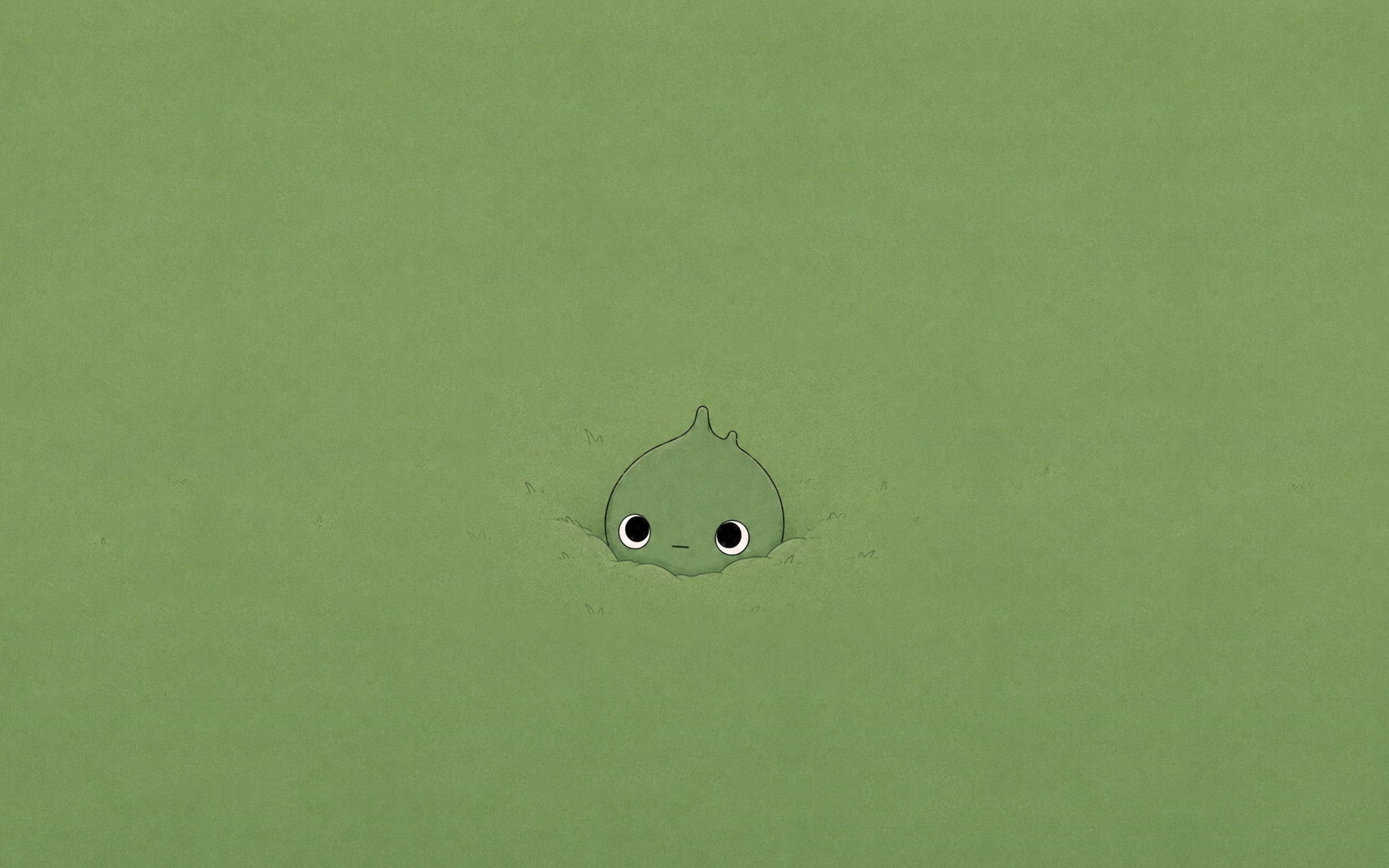 Buck's head peeking up out of a vast green field that fills the whole page
